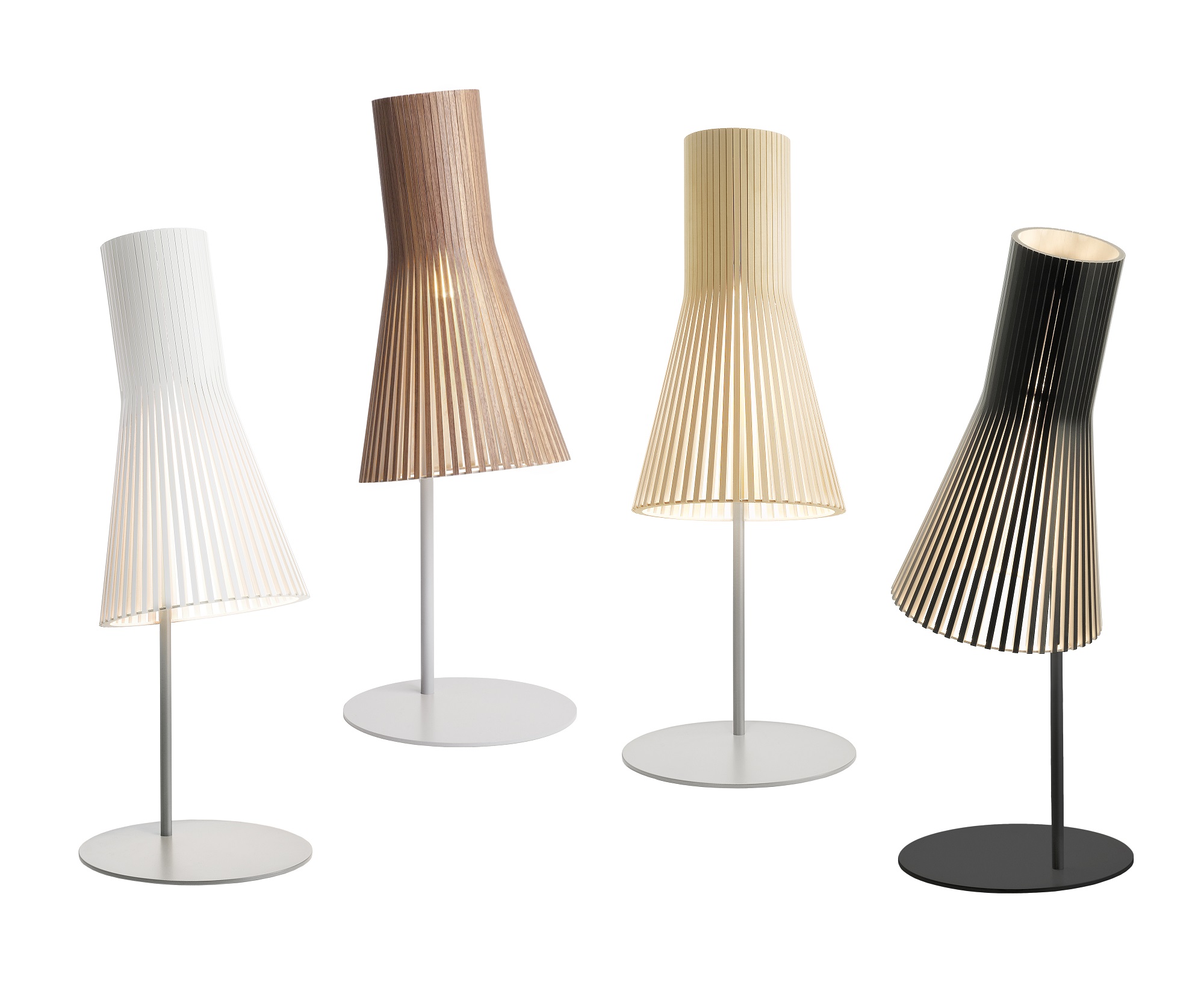 Four table lamps in different colors on a white background.