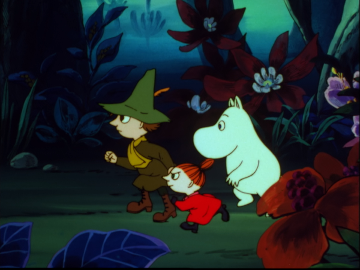 Moomintroll, Snufkin and Little My running in a forest. Still from the animation series Moomin (1990).
