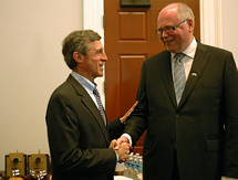Congressman John Carney and Speaker of Parliament Eero Heinäluoma shaking hands.