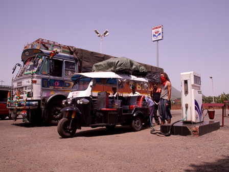 Refueling. In the background is a sample of Indian truck fashion.  Picture: Juho Sarno